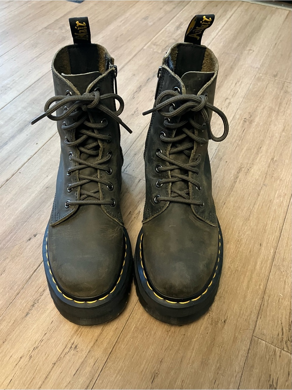 Dr. Martens brown leather lace up platform women’s ankle boots. Size 5